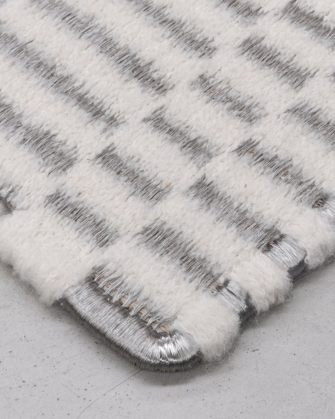 AXXIS WEAVE RUG IN STAINLESS STEEL AND BOUCLÉ ALPACA